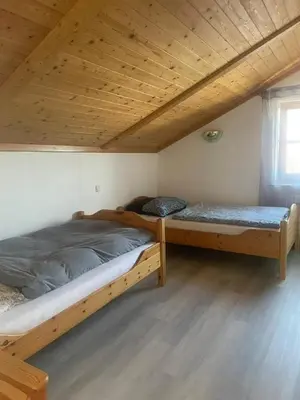Ein Bett oder Betten in einem Zimmer der Unterkunft Lukashof