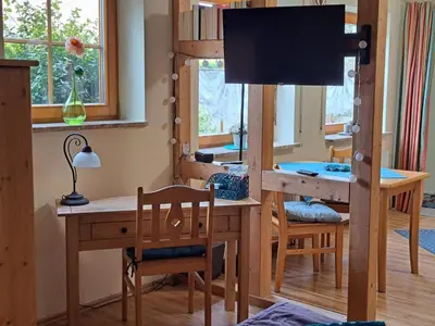 Ein Sitzbereich in der Unterkunft Ferienwohnung Bär