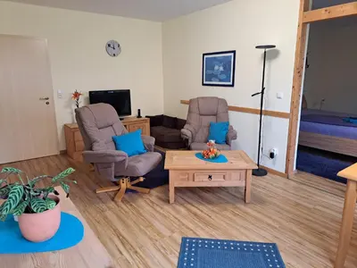Ein Sitzbereich in der Unterkunft Ferienwohnung Bär