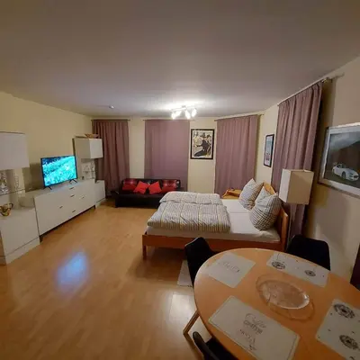 Ein Bett oder Betten in einem Zimmer der Unterkunft Selb Ferienwohnungen