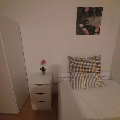 Ein Bett oder Betten in einem Zimmer der Unterkunft Selb Ferienwohnungen