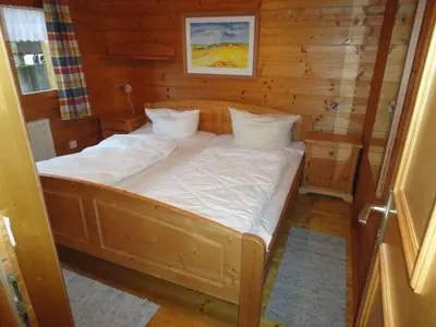 Ein Bett oder Betten in einem Zimmer der Unterkunft Naturerlebnisdorf Stamsried 3