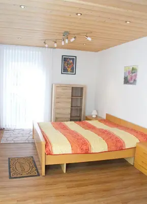 Ein Bett oder Betten in einem Zimmer der Unterkunft Ferienwohnung Ahne
