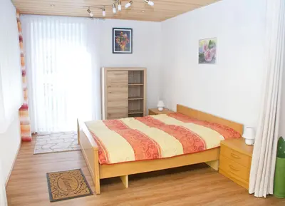 Ein Bett oder Betten in einem Zimmer der Unterkunft Ferienwohnung Ahne