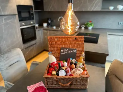 Küche/Küchenzeile in der Unterkunft Ferienwohnung im Chaletstil Bergloft 115 qm Wellness Fitness Sauna Bergrödelhof