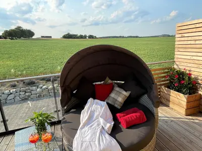 Ein Sitzbereich in der Unterkunft Ferienwohnung im Chaletstil Giebeltraum 115 qm Wellness Fitness Sauna Bergrödelhof