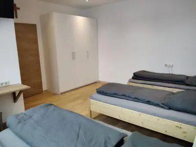 Ein Bett oder Betten in einem Zimmer der Unterkunft Zum Schulhaus