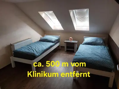 Ein Bett oder Betten in einem Zimmer der Unterkunft Waldquelle