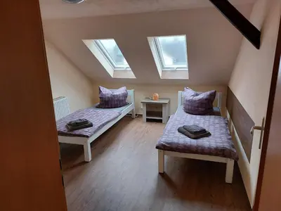Ein Bett oder Betten in einem Zimmer der Unterkunft Waldquelle