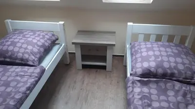 Ein Bett oder Betten in einem Zimmer der Unterkunft Waldquelle
