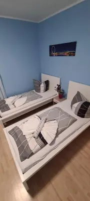Ein Bett oder Betten in einem Zimmer der Unterkunft Möblierte 3-Zimmer-Wohnung im Herz von Schwandorf IDSAD2