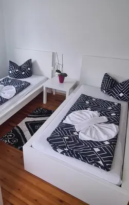 Ein Bett oder Betten in einem Zimmer der Unterkunft Möblierte 3-Zimmer-Wohnung im Herz von Schwandorf IDSAD2