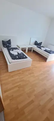 Ein Bett oder Betten in einem Zimmer der Unterkunft Möblierte 3-Zimmer-Wohnung im Herz von Schwandorf IDSAD2