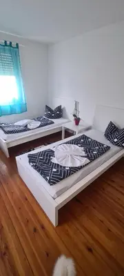 Ein Bett oder Betten in einem Zimmer der Unterkunft Möblierte 3-Zimmer-Wohnung im Herz von Schwandorf IDSAD2