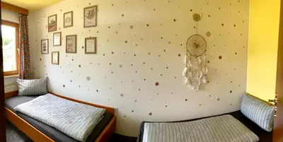 Ein Bett oder Betten in einem Zimmer der Unterkunft Wohlfühlherberge Weitblick