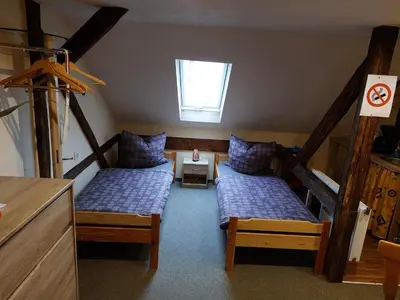 Ein Bett oder Betten in einem Zimmer der Unterkunft Waldquelle Plauen