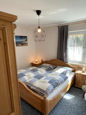 Ein Bett oder Betten in einem Zimmer der Unterkunft Gästehaus Walter