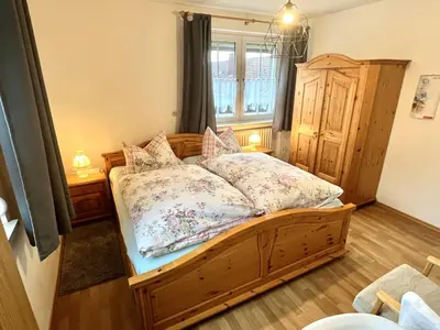 Ein Bett oder Betten in einem Zimmer der Unterkunft Gästehaus Walter