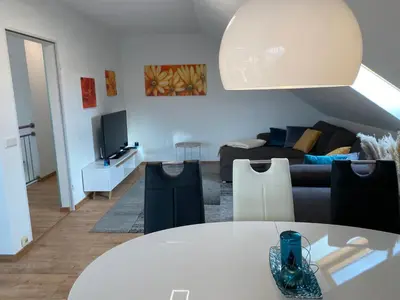 Ein Sitzbereich in der Unterkunft Ferienwohnung Fuchs