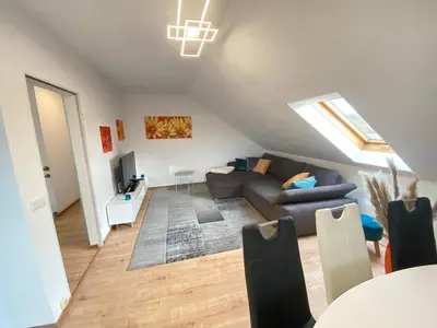Ein Sitzbereich in der Unterkunft Ferienwohnung Fuchs