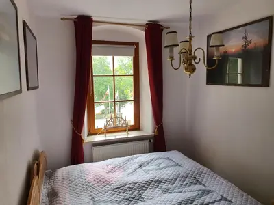 Ein Bett oder Betten in einem Zimmer der Unterkunft Kleiner Saal