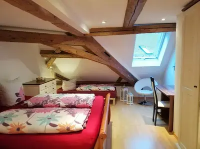 Ein Bett oder Betten in einem Zimmer der Unterkunft Apartment S10 in Bester Lage stilvoll im Zentrum von Bayreuth mit Klimaanlage und Parkplatz