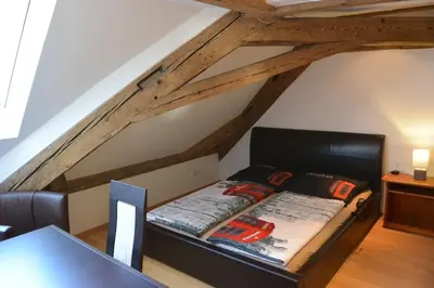 Ein Bett oder Betten in einem Zimmer der Unterkunft Apartment S10 in Bester Lage stilvoll im Zentrum von Bayreuth mit Klimaanlage und Parkplatz