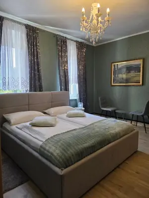 Ein Bett oder Betten in einem Zimmer der Unterkunft Pizzeria Pension Damiano