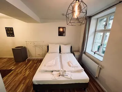 Ein Bett oder Betten in einem Zimmer der Unterkunft Zentrales charmantes Apartment im Altstadtkern