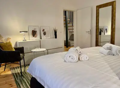 Ein Bett oder Betten in einem Zimmer der Unterkunft VOH SUPER EXKLUSIVES LOFT, ZENTRAL, Smart-TV, Parkplatz