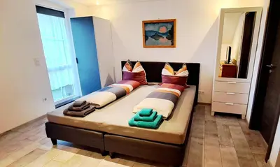 Ein Bett oder Betten in einem Zimmer der Unterkunft Gemütliches Apartment am Gottesberg