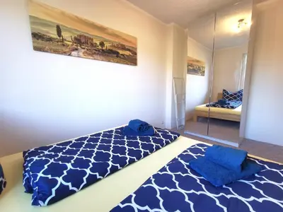 Ein Bett oder Betten in einem Zimmer der Unterkunft Ferienwohnung 