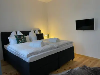 Ein Bett oder Betten in einem Zimmer der Unterkunft VOH Exklusives Wohnhaus MITTEN in Vohenstrauß, bis 8 Personen!!!