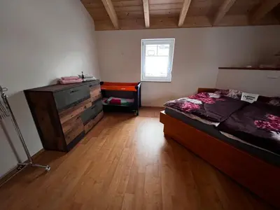 Ein Bett oder Betten in einem Zimmer der Unterkunft Villa Toskana Wohnung 2