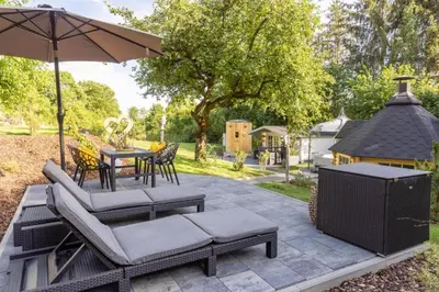 Ein Garten an der Unterkunft Chalet VitaSpa - Whirlpool & Sauna PrivatSpa