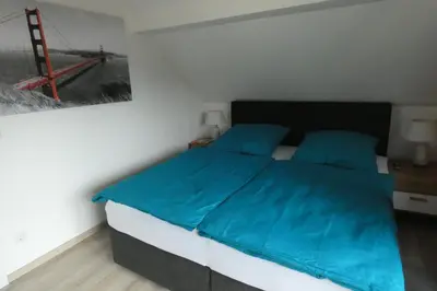 Ein Bett oder Betten in einem Zimmer der Unterkunft Holiday