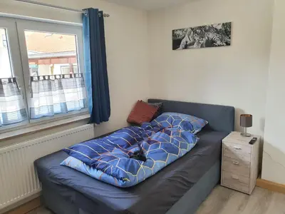 Ein Bett oder Betten in einem Zimmer der Unterkunft Stadtmauergasse