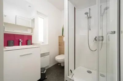 Ein Badezimmer in der Unterkunft Mobilheim am Murner See - private Sauna + privater Badezuber