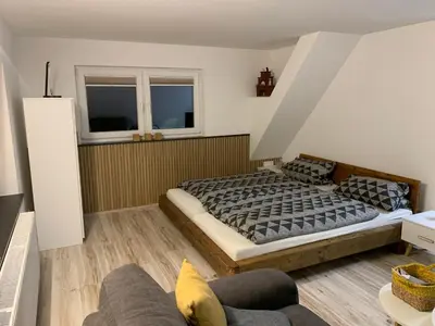 Ein Bett oder Betten in einem Zimmer der Unterkunft Ferienwohnung Stützengrün