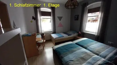 Ein Bett oder Betten in einem Zimmer der Unterkunft Ferienwohnung Rüfflerstub