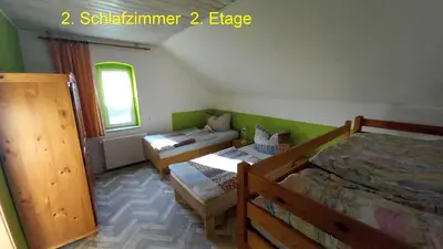 Ein Bett oder Betten in einem Zimmer der Unterkunft Ferienwohnung Rüfflerstub