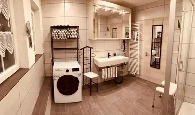 Ein Bett oder Betten in einem Zimmer der Unterkunft Ferienwohnung Erika