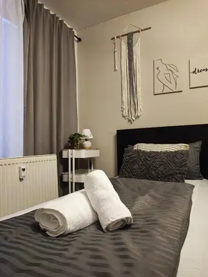 Ein Bett oder Betten in einem Zimmer der Unterkunft Stucky No. 22