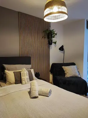 Ein Bett oder Betten in einem Zimmer der Unterkunft van Art Stucky
