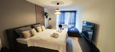 Ein Bett oder Betten in einem Zimmer der Unterkunft van Art Stucky