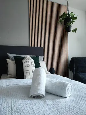 Ein Bett oder Betten in einem Zimmer der Unterkunft van Art Stucky