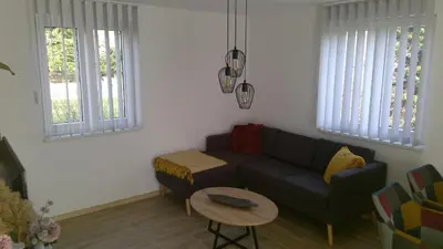 Ein Sitzbereich in der Unterkunft Ferienhaus Am Alten Kirchsteig