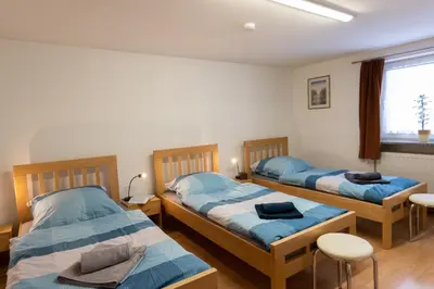 Ein Bett oder Betten in einem Zimmer der Unterkunft Ferienwohnung am Bach