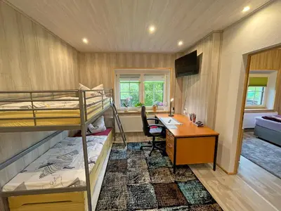 Ein Bett oder Betten in einem Zimmer der Unterkunft Neu Ferienwohnung Kriesten