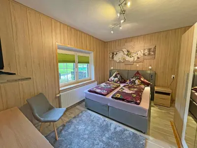 Ein Bett oder Betten in einem Zimmer der Unterkunft Neu Ferienwohnung Kriesten